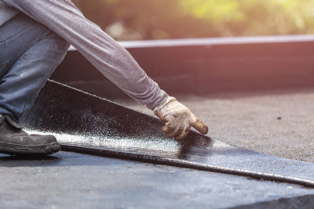Professional Basement Waterproofing technician working in Warsaw, OH